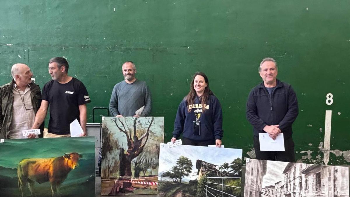 Los ganadores de 2026 junto a sus obras.