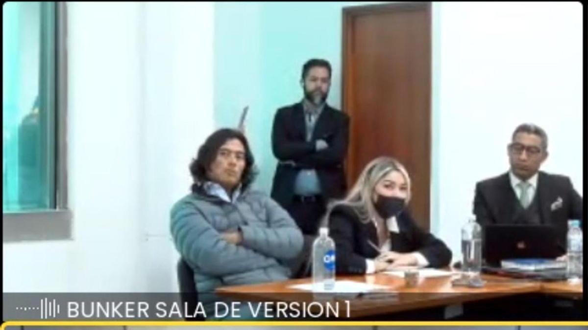 Captura de pantalla de un momento de la audiencia pública de imputación de cargos a Nicolás Petro (i) y su exesposa Daysuris Vásquez (c).