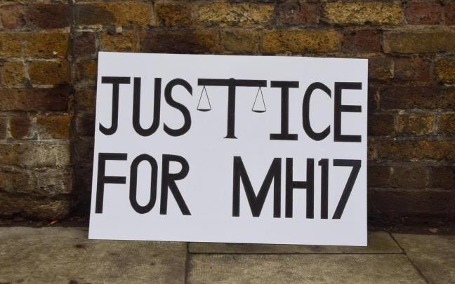 Un cartel pide justicia para las víctimas del vuelo MH17, derribado en 2014 en Ucrania. / EP Un cartel pide justicia para las víctimas del vuelo MH17, derribado en 2014 en Ucrania.