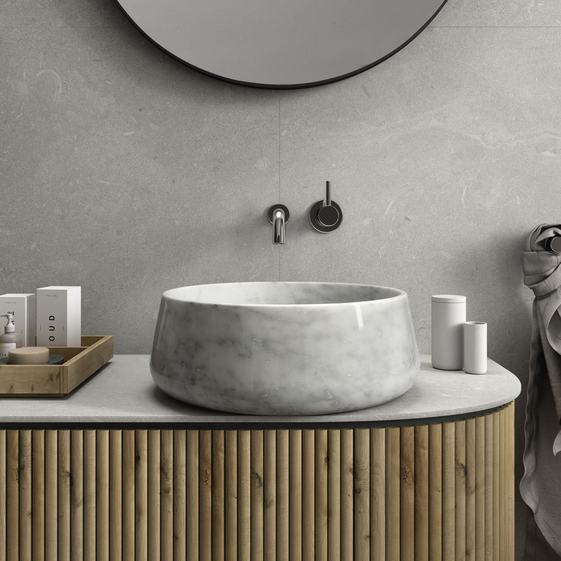 Lavabo de piedra natural pulida.