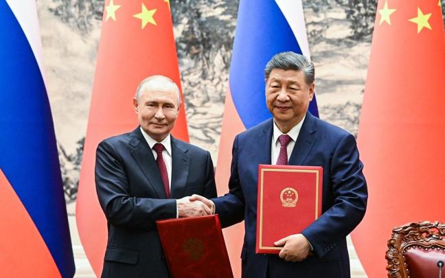 Los presidentes de Rusia y China, Vladímir Putin y Xi Jinping, durante la visita del mandatario ruso a Pekín.