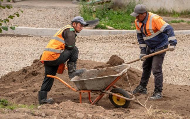 Imagen de archivo de dos trabajadores extranjeros.