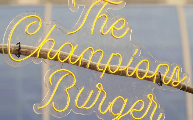 Cartel The Champions Burger Donostia. X: @REALSOCIEDAD Cartel The Champions Burger Donostia. X: @REALSOCIEDAD